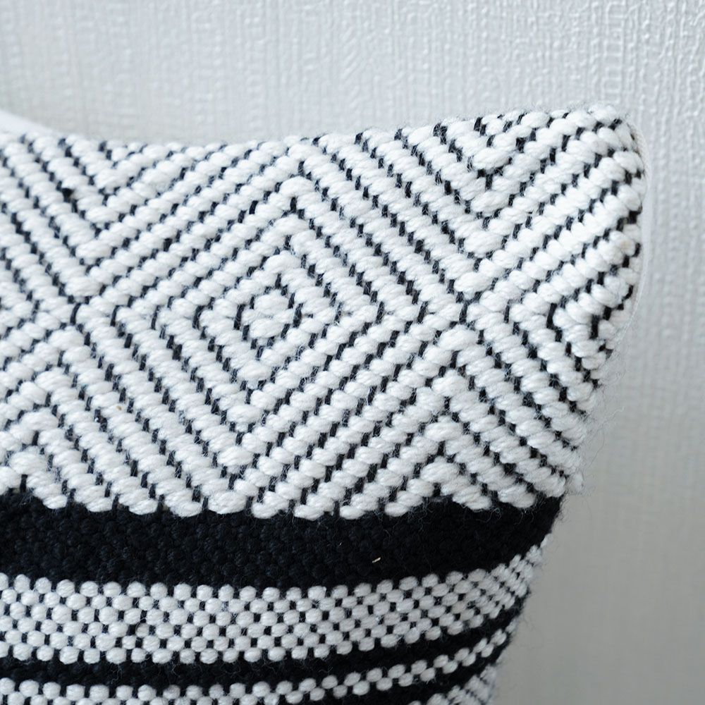 Black and store white chevron cushion