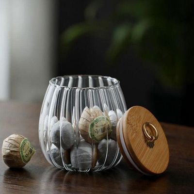 1CHASE Borosilicate Glass Storage Jar With Airtight Bamboo Lid and Metal Handle, Petal Decorative Container, To Store Tea, Coffee Beans, Candy, Spices, Biscuits 700 ML (Oval)