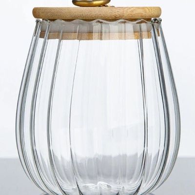 1CHASE Borosilicate Glass Storage Jar With Airtight Bamboo Lid and Metal Handle, Petal Decorative Container, To Store Tea, Coffee Beans, Candy, Spices, Biscuits 700 ML (Oval)