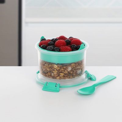 Sistema Breakfast Bowl To Go 530ML stackable food storage container with removable tray, a spoon and easy locking clips. Is Microwave, dishwasher safe & BPA Free, Green Clip