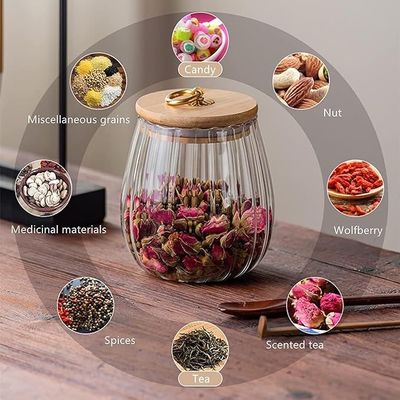 1CHASE Borosilicate Glass Storage Jar With Airtight Bamboo Lid and Metal Handle 700ML (Set Of 4) (Oval), Petal Decorative Container, To Store Tea, Coffee Beans, Candy, Spices, Biscuits (Oval)
