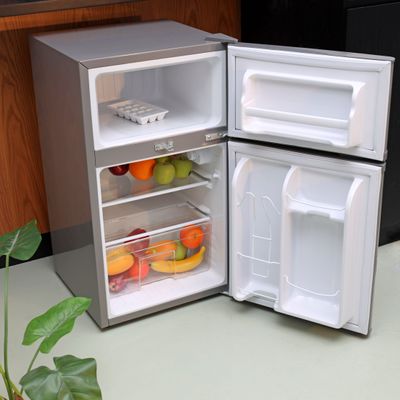 Geepas 125L Gross/85L Net Capacity, Double Door Defrost Refrigerator With Rapid Cooling Function, Tropic Type, CFC Free, Interior Lamp, Adjustable Leg, Hook & Key, Outside Condenser  Fridge - 60L/Freezer- 25L capacity GRF1259GPE Metallic grey