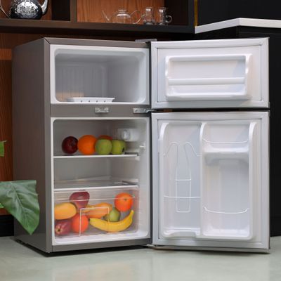 Geepas 125L Gross/85L Net Capacity, Double Door Defrost Refrigerator With Rapid Cooling Function, Tropic Type, CFC Free, Interior Lamp, Adjustable Leg, Hook & Key, Outside Condenser  Fridge - 60L/Freezer- 25L capacity GRF1259GPE Metallic grey Geepas 125L Gross/85L Net Capacity, Double Door Defrost Refrigerator With Rapid Cooling Function, Tropic Type, CFC Free, Interior Lamp, Adjustable Leg, Hook & Key, Outside Condenser  Fridge - 60L/Freezer- 25L capacity GRF1259GPE Metallic grey