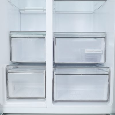 Geepas 650L Gross/521L Net Capacity No Frost Side By Side Refrigerator With Inverter Compressor, Tempered Glass Shelf, Twist Ice Maker, LED Lighting, Digital Control Temperature Display  Fridge - 344L/Freezer- 177L capacity GRFS6521SXHN Silver