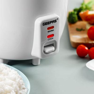 Geepas Rice Cooker with Non-Stick Cooking Pot | Automatic Cooking, Steam Vent Lid & Simple One Touch Operation, Multi Functional, Cool Touch Handle|Make Rice, Steam Healthy Food & Vegetables 0.6 L 300 W GRC1828 White