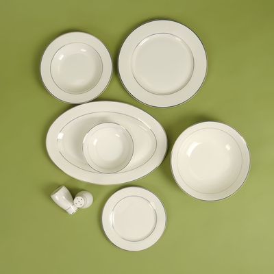 Royalford 28 Piece Premium Bone China Dinner Set- RF11048 | Includes Oval Plate, Dinner Plates, Soup Plates, Flat Plates, Salad Bowls, Bowls, and Salt and Pepper Pots| Dishwasher-Safe and Freezer-Friendly| Eco-Friendly and Food-Grade| White and Silver 