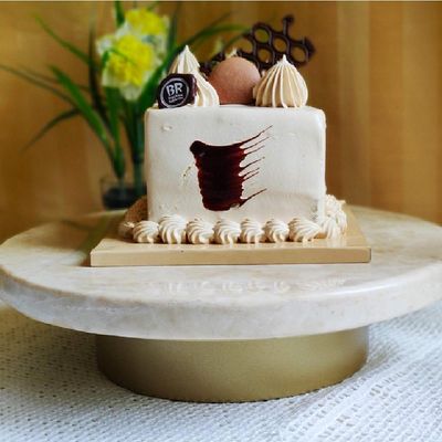 Beige Marble Cake Stand with marble top and round metal stand