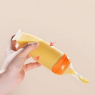 Twisoo Silicone Baby Food Feeder Bottle with Spoon - 120ML BPA-Free Squeeze Feeder for Toddlers, Ideal for Semi-Solid Foods, Cereals, Purees & Anti-Colic Design (Orange)