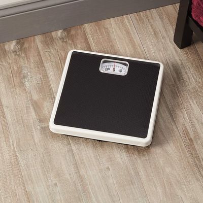 Taylor Analog Scales for Body Weight, Rotating Dial, 300 LB Capacity, Black Textured Mat with Durable Metal Platform, Easy to Clean, 10.0 x 10.0 Inches, Black