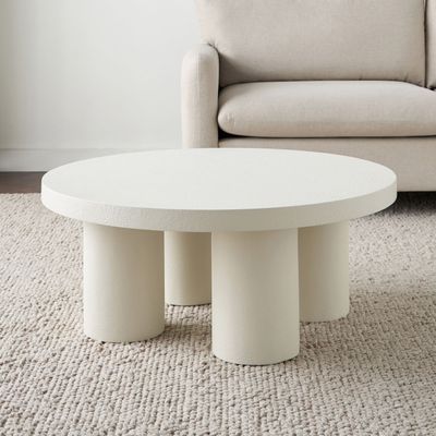 Ember Coffee Table – Luxury Round Center Table with Textured Finish & Cylindrical Leg Design