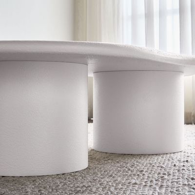 Halo Coffee Table – Modern Organic Center Table with Sculptural Curves & Cylindrical Base Design