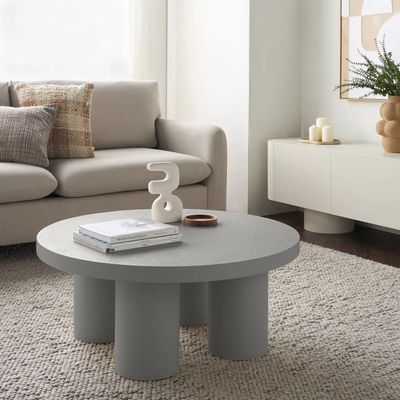 Ember Coffee Table – Modern Round Center Table with Textured Finish & Cylindrical Legs