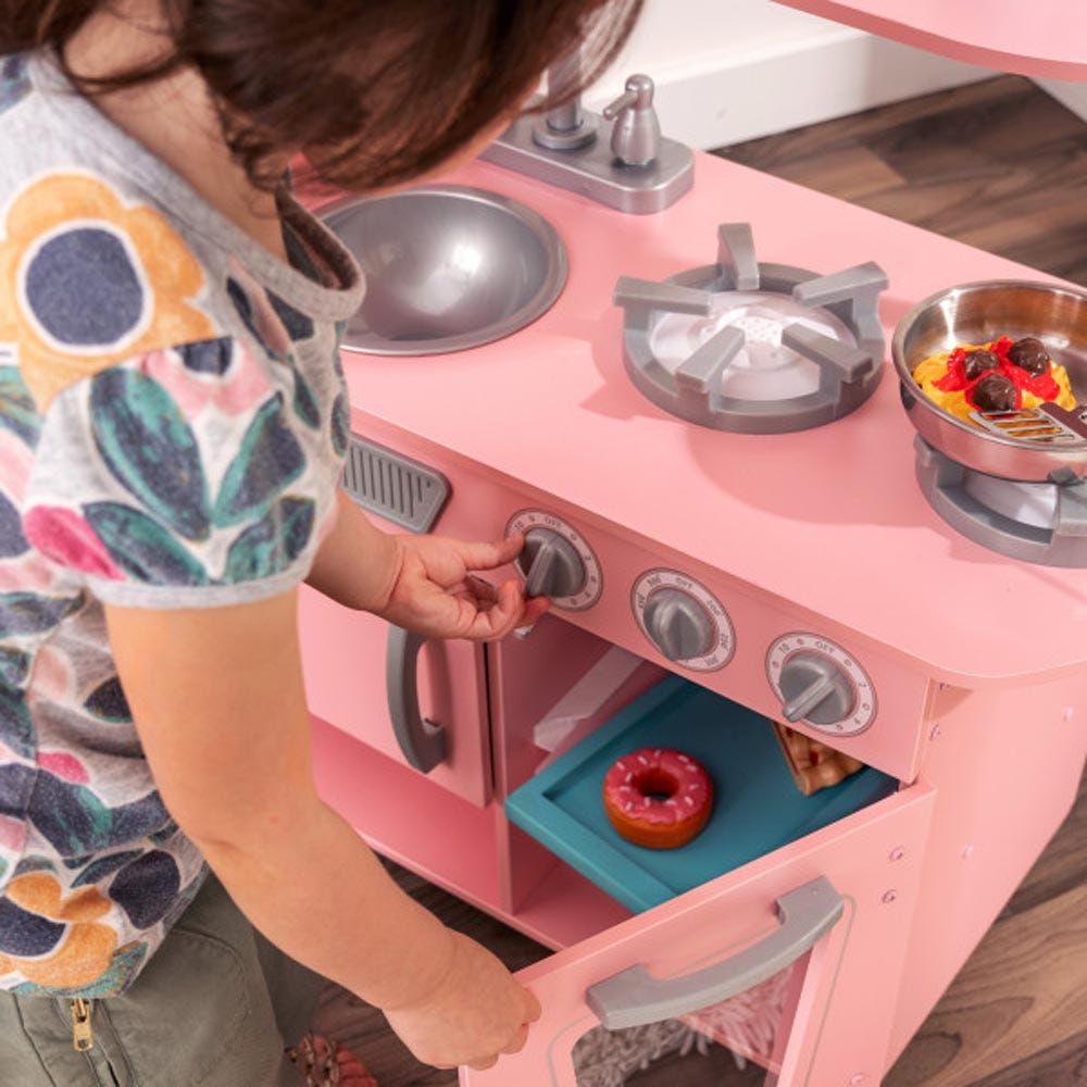 Pink vintage store play kitchen