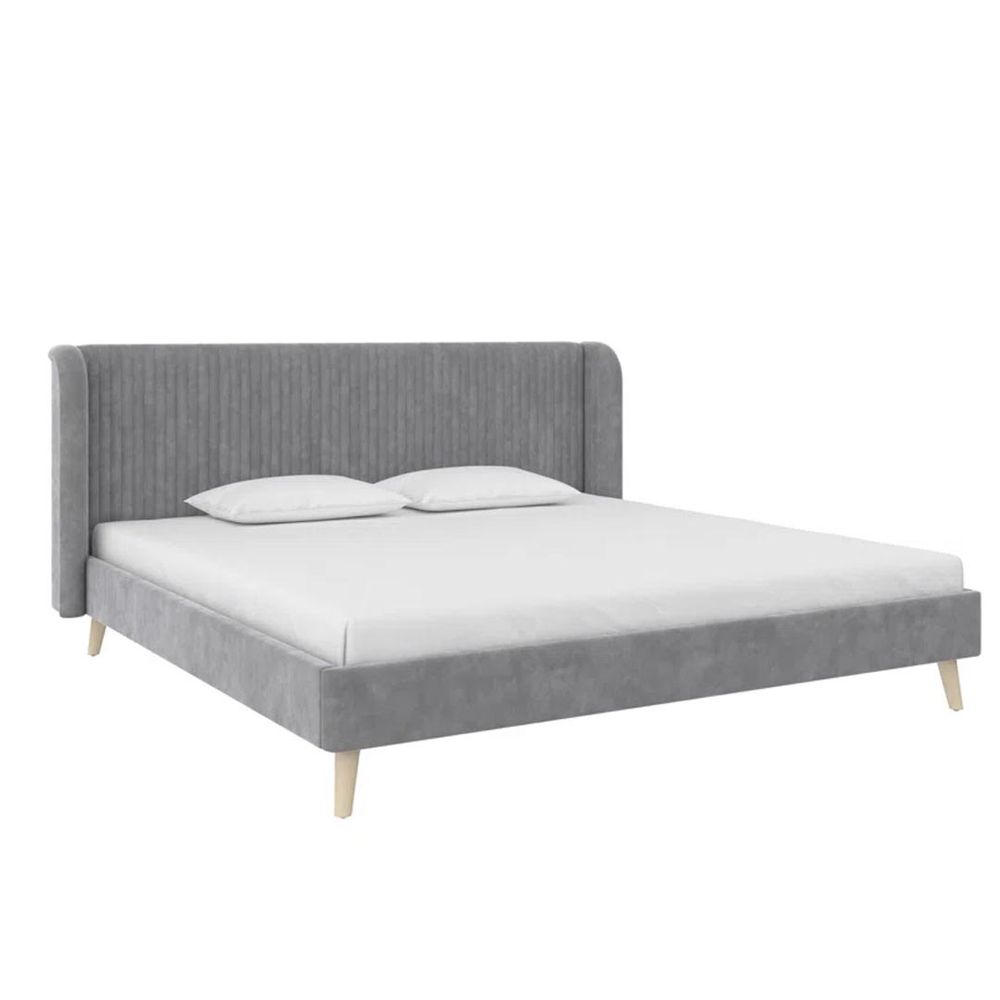 Grey cushioned store bed frame