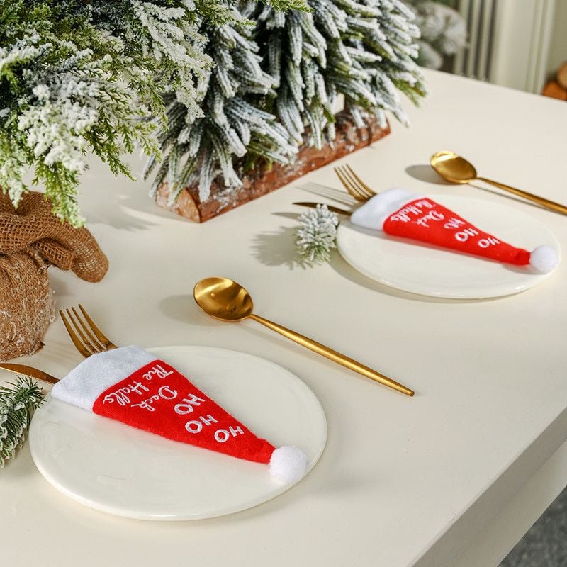 مجموعة من 4 حامل أدوات فضية لقبعة عيد الميلاد لطاولة العشاء.