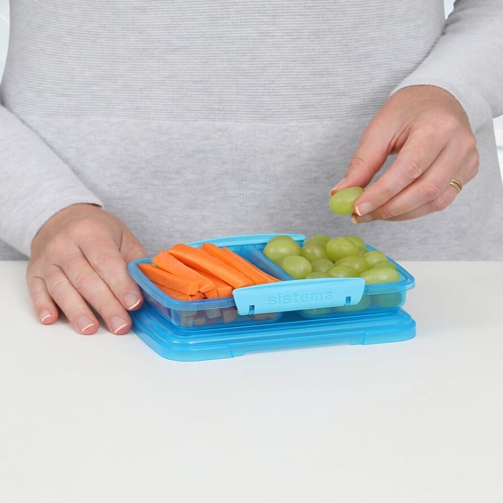 Sistema Small Split Lunch box 350ML comes with 2 stackable compartments & easy locking clips + flexible seals. Its microwave & dishwasher safe and BPA Free. Blue